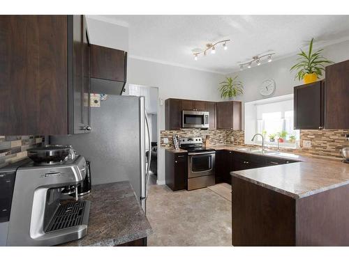 9618 64 Avenue Avenue, Grande Prairie, AB - Indoor Photo Showing Kitchen