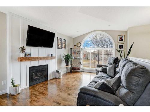 9010 Lakeshore Drive, Grande Prairie, AB - Indoor Photo Showing Living Room With Fireplace