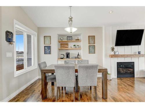 9010 Lakeshore Drive, Grande Prairie, AB - Indoor Photo Showing Dining Room With Fireplace