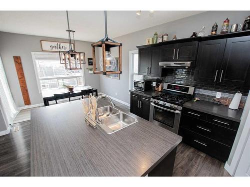 10217 125 Avenue, Grande Prairie, AB - Indoor Photo Showing Kitchen With Double Sink