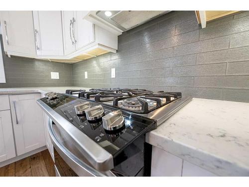 8813 60 Avenue, Grande Prairie, AB - Indoor Photo Showing Kitchen With Upgraded Kitchen