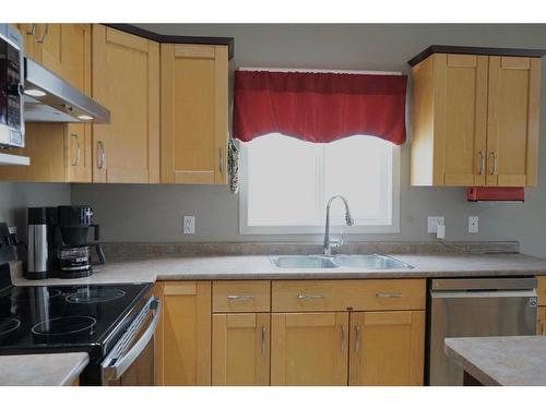 11109 O'Brien Lake Drive, Grande Prairie, AB - Indoor Photo Showing Kitchen With Double Sink