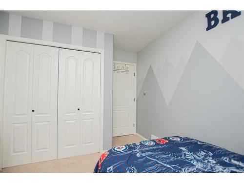 8905 71 Avenue, Grande Prairie, AB - Indoor Photo Showing Bedroom
