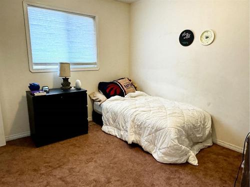 9009 93 Avenue, Grande Prairie, AB - Indoor Photo Showing Bedroom