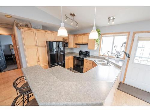 10310 73 Avenue, Grande Prairie, AB - Indoor Photo Showing Kitchen With Double Sink
