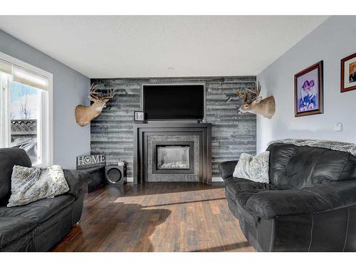 10909 O'Brien Crescent, Grande Prairie, AB - Indoor Photo Showing Living Room With Fireplace