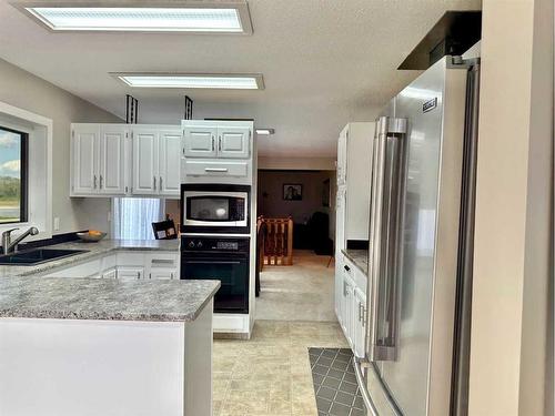 7209 96 Street, Peace River, AB - Indoor Photo Showing Kitchen With Double Sink