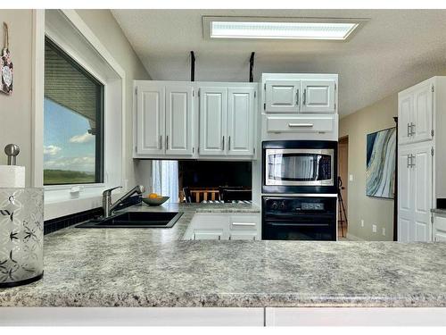 7209 96 Street, Peace River, AB - Indoor Photo Showing Kitchen With Double Sink