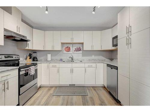 10613 114C Street, Grande Prairie, AB - Indoor Photo Showing Kitchen With Double Sink