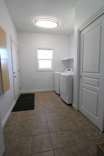 9005 Lakeshore Drive, Grande Prairie, AB - Indoor Photo Showing Laundry Room