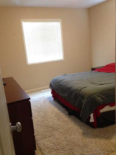 L101-8640 103 Avenue, Grande Prairie, AB - Indoor Photo Showing Bedroom