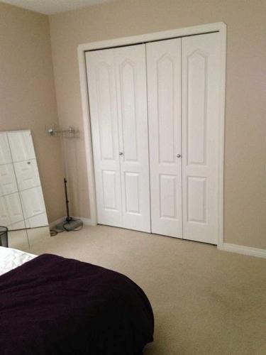 L101-8640 103 Avenue, Grande Prairie, AB - Indoor Photo Showing Bedroom