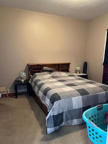 201-9225 Lakeland Drive, Grande Prairie, AB - Indoor Photo Showing Bedroom
