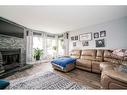 10119 105 Avenue, Peace River, AB  - Indoor Photo Showing Living Room With Fireplace 