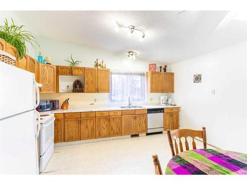 9310 70A Avenue, Grande Prairie, AB - Indoor Photo Showing Kitchen