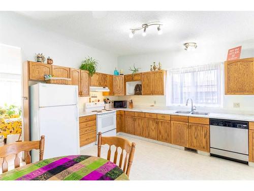 9310 70A Avenue, Grande Prairie, AB - Indoor Photo Showing Kitchen