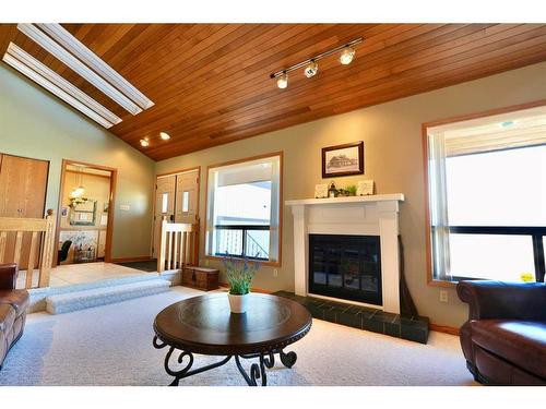 7213 96 Street, Peace River, AB - Indoor Photo Showing Living Room With Fireplace