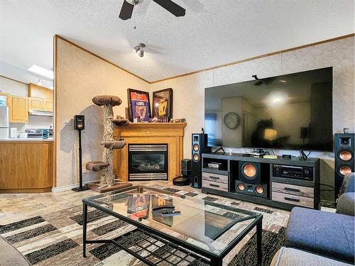 266 Mawdsley Crescent, Grande Cache, AB - Indoor Photo Showing Living Room With Fireplace