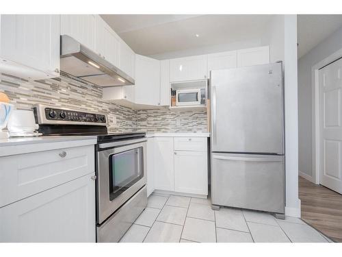 9245 96 Avenue, Grande Prairie, AB - Indoor Photo Showing Kitchen With Stainless Steel Kitchen With Upgraded Kitchen