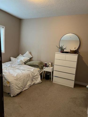 208-9221 Lakeland Drive, Grande Prairie, AB - Indoor Photo Showing Bedroom