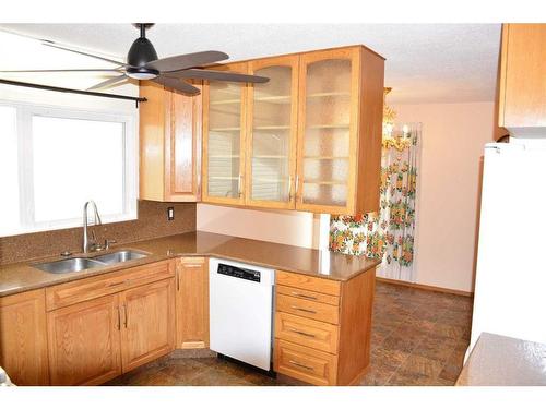 9621 83 Avenue, Peace River, AB - Indoor Photo Showing Kitchen With Double Sink
