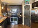 7434 89 Street, Grande Prairie, AB  - Indoor Photo Showing Kitchen With Double Sink 