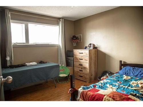 10308 103 Street, High Level, AB - Indoor Photo Showing Bedroom