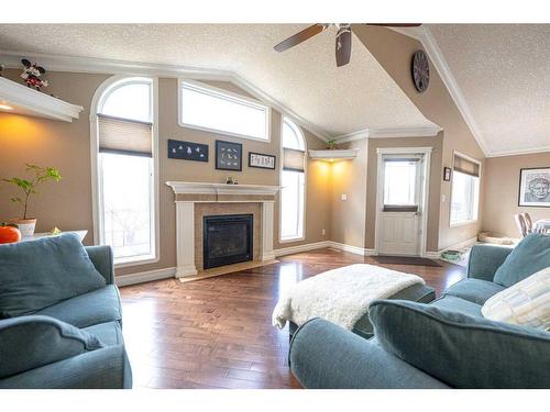 6914 114A Street, Grande Prairie, AB - Indoor Photo Showing Living Room With Fireplace
