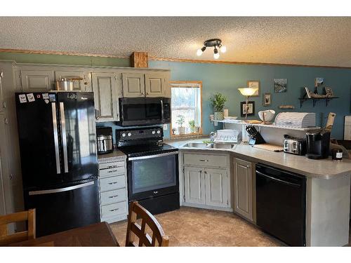 24003 Twp Rd 810, Rural Fairview No. 136, M.D. Of, AB - Indoor Photo Showing Kitchen With Double Sink