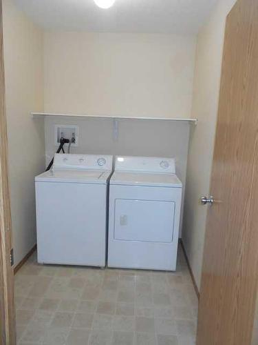 206 ,300, 302-12015 Royal Oaks Drive, Grande Prairie, AB - Indoor Photo Showing Laundry Room