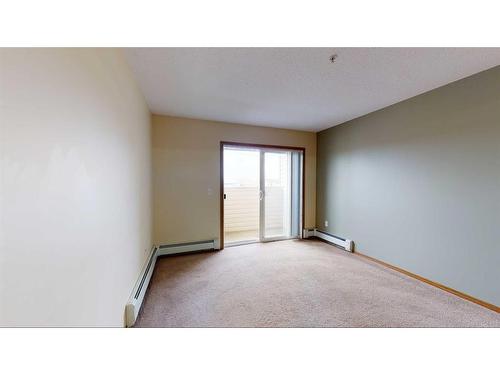 206 ,300, 302-12015 Royal Oaks Drive, Grande Prairie, AB - Indoor Photo Showing Other Room