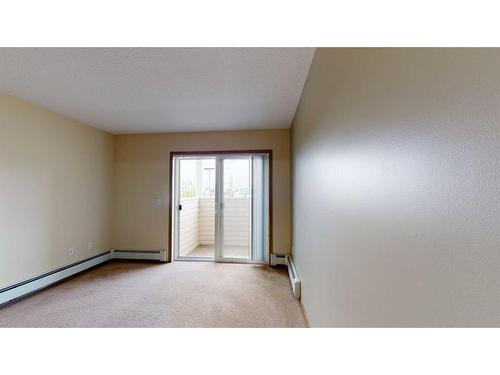 206 ,300, 302-12015 Royal Oaks Drive, Grande Prairie, AB - Indoor Photo Showing Other Room