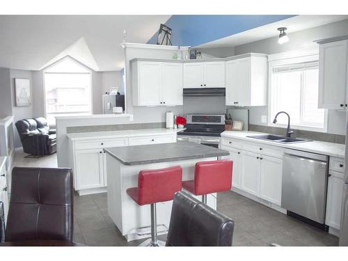 62 Pinnacle Lake Drive, Grande Prairie, AB - Indoor Photo Showing Kitchen With Double Sink