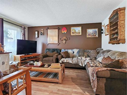 10909 Swann Drive, Grande Cache, AB - Indoor Photo Showing Living Room