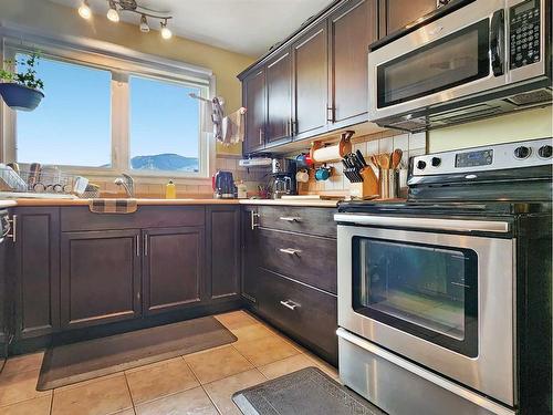 10909 Swann Drive, Grande Cache, AB - Indoor Photo Showing Kitchen