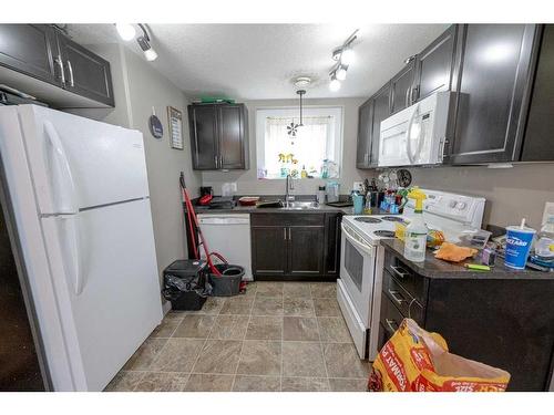 11542 73 Avenue, Grande Prairie, AB - Indoor Photo Showing Kitchen With Double Sink