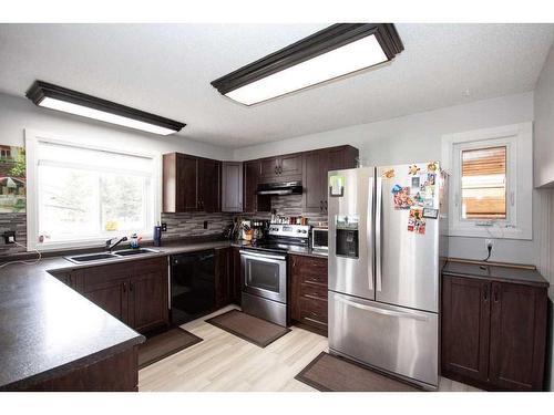 6409 96 Street, Grande Prairie, AB - Indoor Photo Showing Kitchen With Double Sink