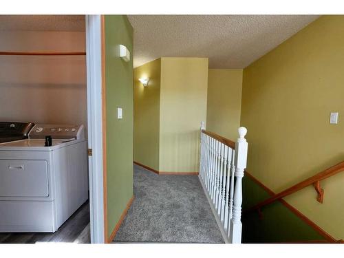 9110 136 Avenue, Peace River, AB - Indoor Photo Showing Laundry Room