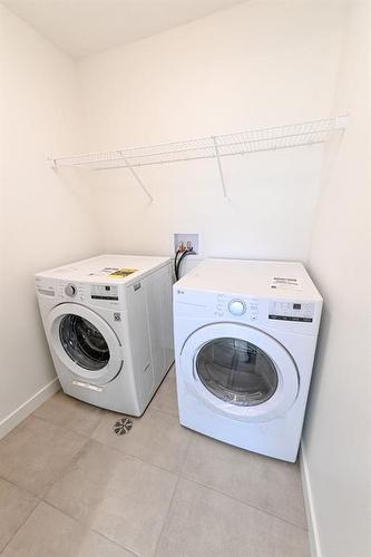 8726 128 Avenue, Grande Prairie, AB - Indoor Photo Showing Laundry Room