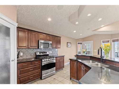 6810 102 Street, Grande Prairie, AB - Indoor Photo Showing Kitchen With Double Sink