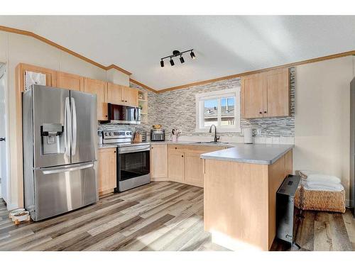 9503 109 Avenue, Clairmont, AB - Indoor Photo Showing Kitchen With Stainless Steel Kitchen With Double Sink