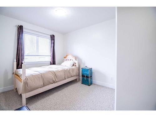 6026 87 A Street, Grande Prairie, AB - Indoor Photo Showing Bedroom