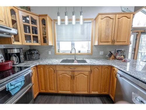 9318 69 Avenue, Grande Prairie, AB - Indoor Photo Showing Kitchen With Double Sink
