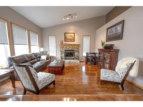 9318 69 Avenue, Grande Prairie, AB - Indoor Photo Showing Living Room With Fireplace