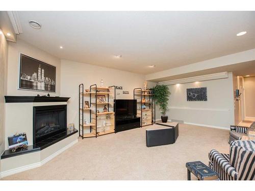 12602 Lakeshore Drive, Grande Prairie, AB - Indoor Photo Showing Living Room With Fireplace