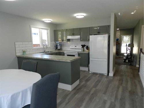 10022 84 Street, Peace River, AB - Indoor Photo Showing Kitchen With Double Sink