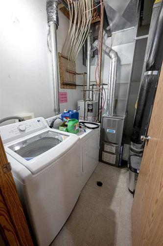 13106 93 Street, Grande Prairie, AB - Indoor Photo Showing Laundry Room