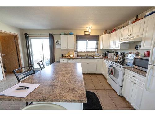 13106 93 Street, Grande Prairie, AB - Indoor Photo Showing Kitchen With Double Sink