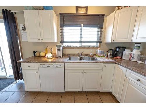 13106 93 Street, Grande Prairie, AB - Indoor Photo Showing Kitchen With Double Sink