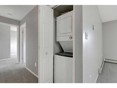 203-11230 104 Avenue, Grande Prairie, AB - Indoor Photo Showing Laundry Room